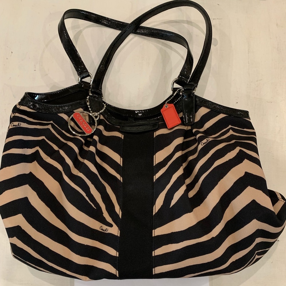 Coach tan and black zebra striped purse